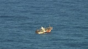 Coast Guard overflight reconfirms position of unmanned Japanese vessel
