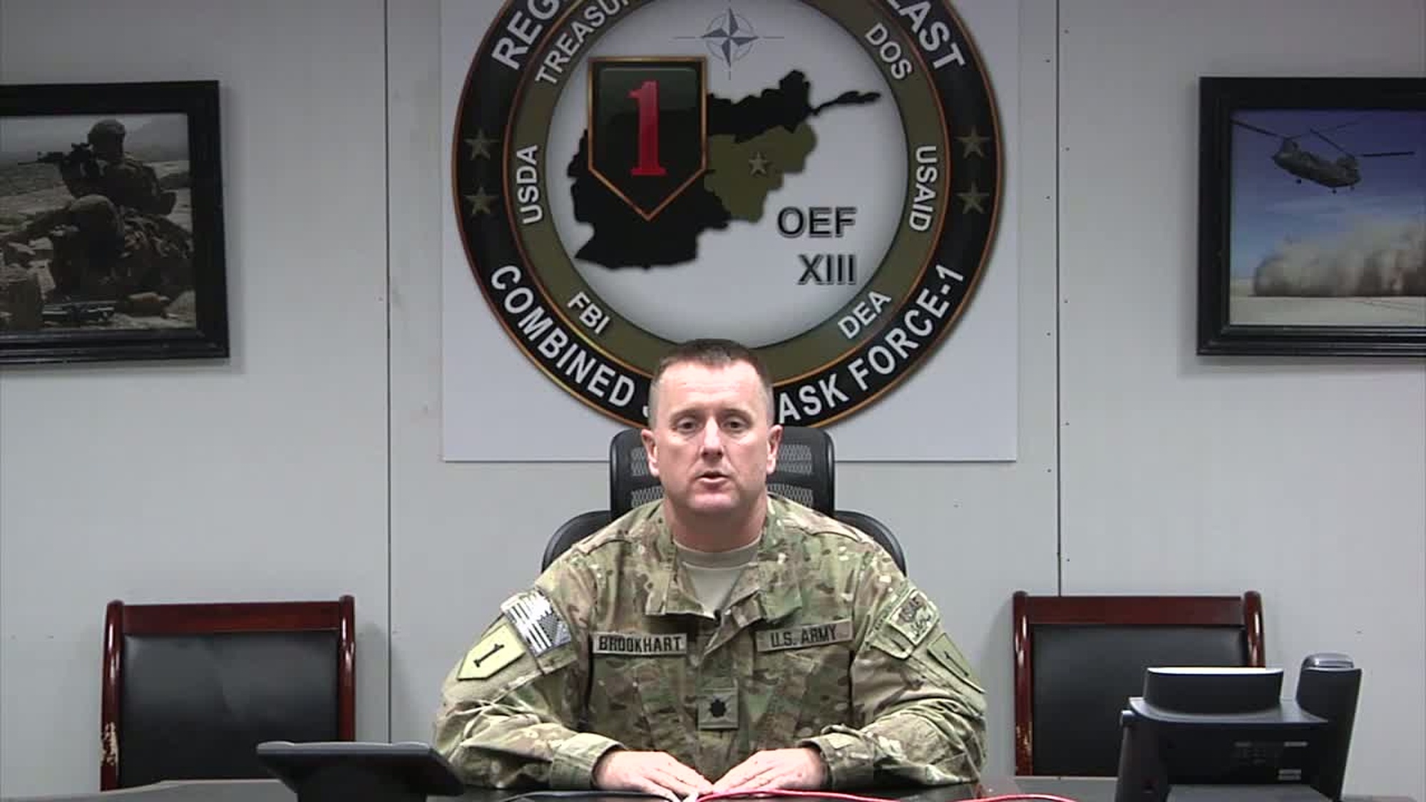 Members of CJFT-1 Legal send greetings to service members back at Fort Riley. Also available in high definition