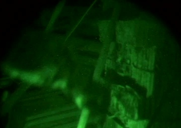 Paratroopers Unload Equipment