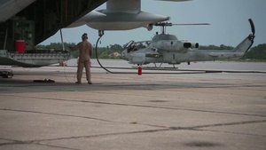 VMGR-252 Marines refuel HMLA-467 AH-1W Super Cobras during Exercise Mailed Fist