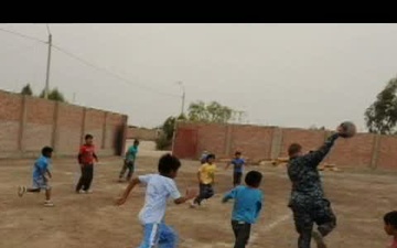 Sailors Play Soccer With Local Children