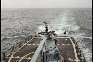 Air Crew Members Wash Down SH-60B