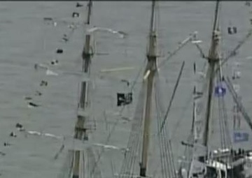 Tall ships tower over Baltimore's harbor
