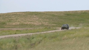 191st Military Police Commander tests portable barricade.