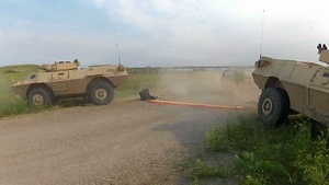 191st Military Police Commander tests portable barricade.