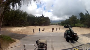 Wide Shot of LCAC Deploying Forces and Equipment to Beach