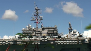 USS Kitty Hawk Departing