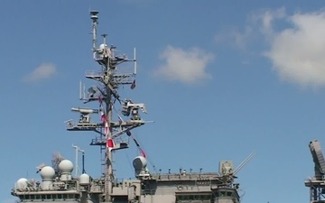 USS Kitty Hawk Departing