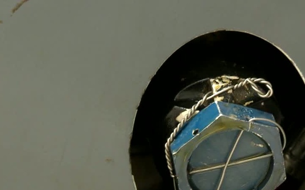 RAF MQ-9 Reaper Being Worked on by USAF MQ-9 Reaper Maintainers