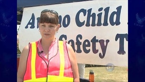 Nurse teaches parents proper child-safety seat use