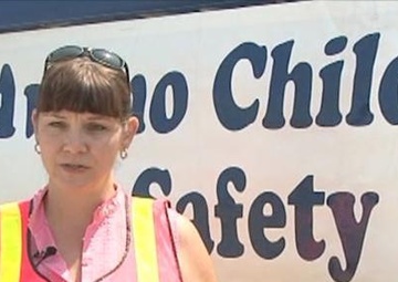 Nurse teaches parents proper child-safety seat use