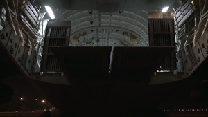 Airmen Prepare to Transport Trucks and Utility Workers to Storm Damaged East Coast