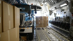 Travis Airmen aid in shipment of cargo in support of hurricane Sandy relief effort