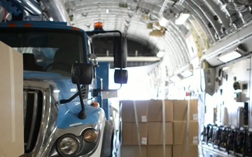 Travis Airmen aid in shipment of cargo in support of hurricane Sandy relief effort