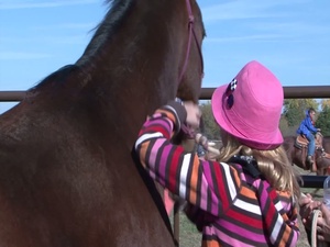 Military Kids Ride Horses with Heroes