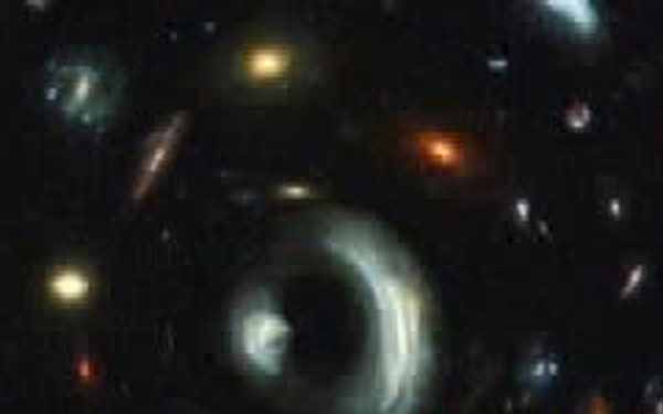 Biggest 'Zoom Lens' in Space Takes Hubble Deeper into the Universe