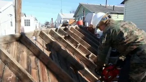 Marines Using Chainsaws at Breezy Point, N.Y.