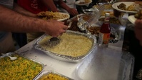Single Marines, Sailors Get a Taste of Home for Thanksgiving