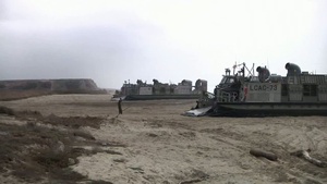 Sailors Support Marine Beach Landing with LCACs