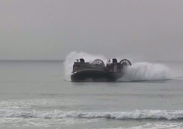 Sailors Support Marine Beach Landing with LCACs