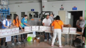Puerto Rico National Guard Fix Care Packages for Deployed Troops