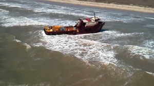 Grounded oil rig platform supply vessel