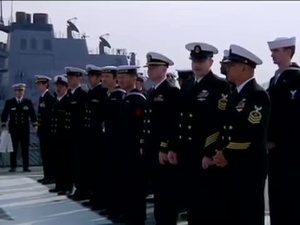 USS Defender Sailor Re-Enlists Aboard Japanese Vessel