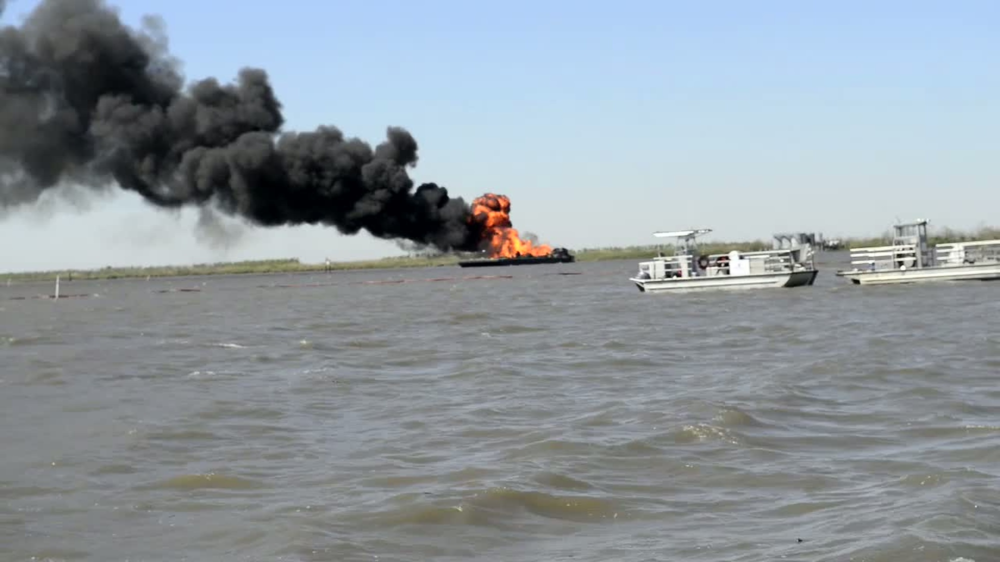 A pipeline burns after an allision with tug boat Shanon E. Setton, near Bayou Perot 30 miles south of New Orleans, March 13, 2013. The Coast Guard is working with federal, state and local agencies in response to this incident to ensure the safety of responders and contain and clean up any oil that is leaking. (U.S. Coast Guard video by Petty Officer 3rd Class Ryan Tippets) Available in High Definition.