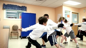 Kids Learning to Fence