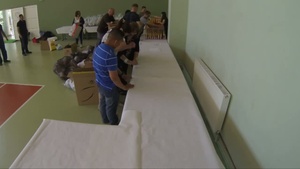 Marines, Sailors Lend a Helping Hand to Children in Romania