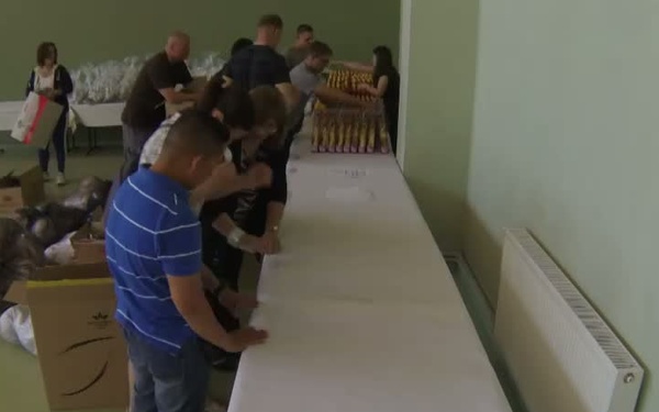 Marines, Sailors Lend a Helping Hand to Children in Romania