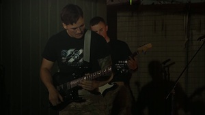 SPC Rory Garcia Plays Original Songs For Troops