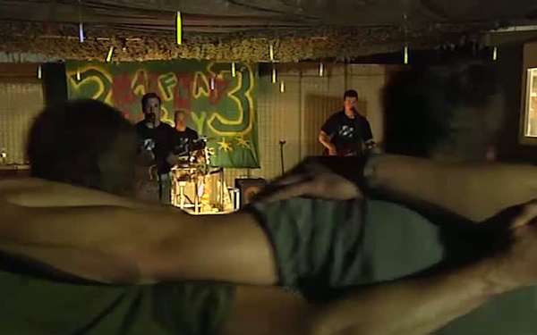 SPC Rory Garcia Plays Original Songs For Troops