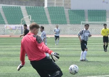 2ID Soldiers and Civilians Enjoy Soccer Together