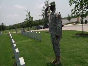 Soldiers Placing Flags for the Fallen