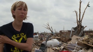 Tinker AFB Civilian Surveys the Damage to Her Home in Moore, Okla.