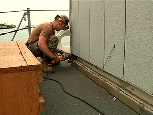 Sailors Volunteer To Help Out Seabees