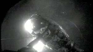 A Neck Injury Victim is Hoisted into a Coast Guard Helicopter