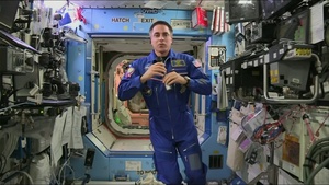 Navy Midshipman Chats with Astronaut