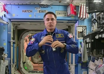 Navy Midshipman Chats with Astronaut