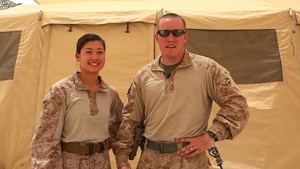Lt. Tommy Cryer and Lt. j.g. Karen Cryer shout out to the Seattle Seahawks from Afghanistan