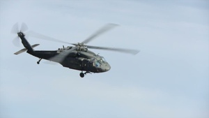 UH-60L Blackhawk Helicopters Fly Through Canyons