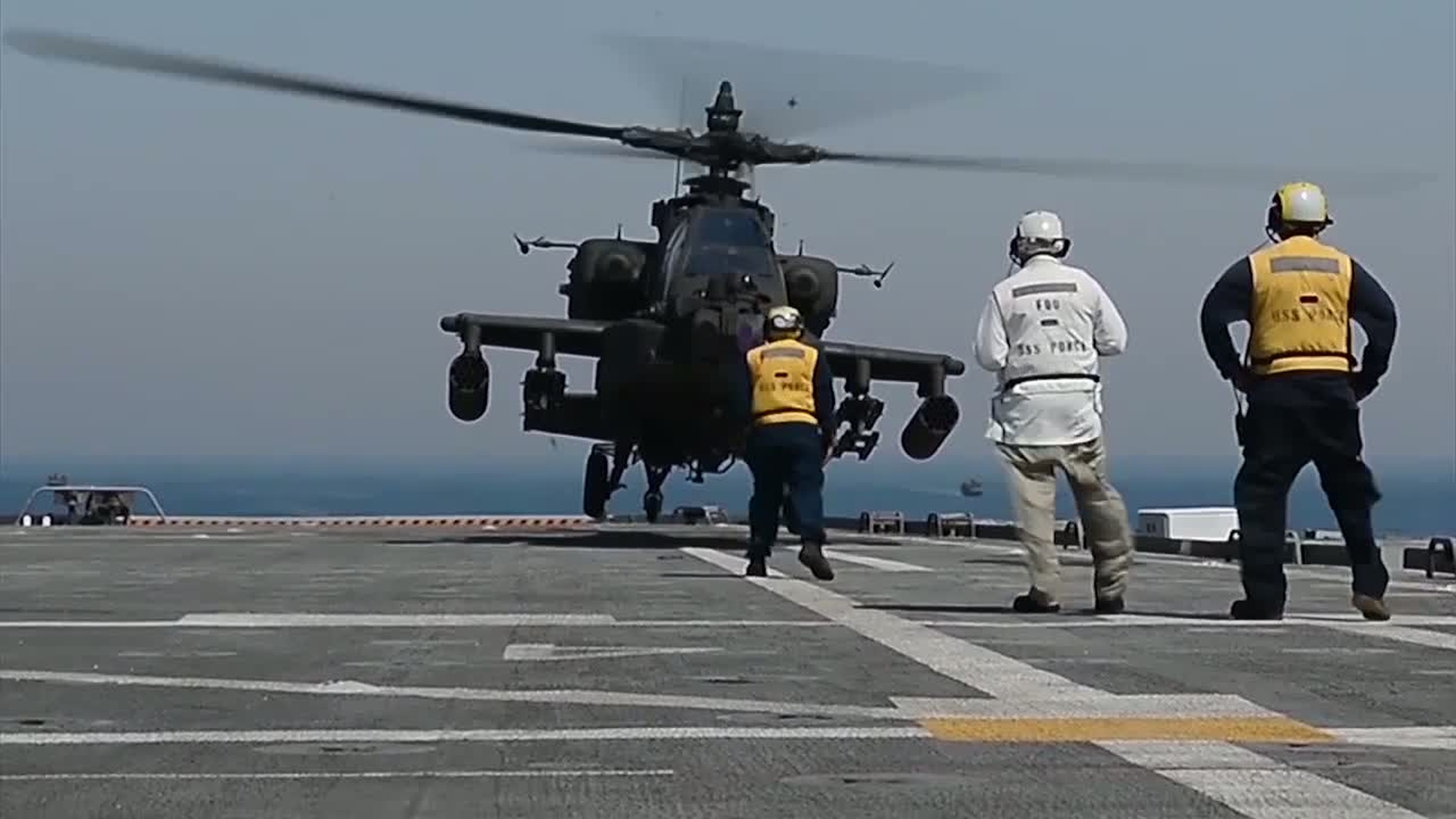 U.S. 5th Fleet Area of Responsibility - U.S. Army UH-60 Black Hawk helicopters and AH-64D Apache helicopter, assigned to 36th Combat Aviation Brigade, conduct daytime landing qualifications aboard the Afloat Forward Staging Base USS Ponce (AFSB 15). Ponce is deployed to support maritime security operations and mine counter measure efforts in the U.S. 5th Fleet area of responsibility. (U.S. Navy Video by Mass Communication Specialist Michael Sandberg/Released)