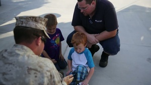 Dark Horse Battalion Honored During High School Football Exhibition (B-roll)