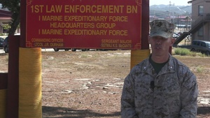 Marines Hike Through Hills as a Team