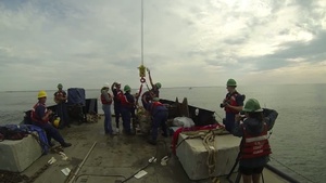 Coast Guard Cutter Smilax Recovering Pirate Cannons from the Queen Anne's Revenge near Fort Macon, N.C.