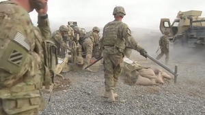 1-76 FA fires M777 Howitzer