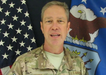 Lt. Col. John White greets family