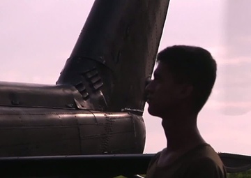 Philippine Air Force Members Prepare for Flight in Helo During Operation Damayan