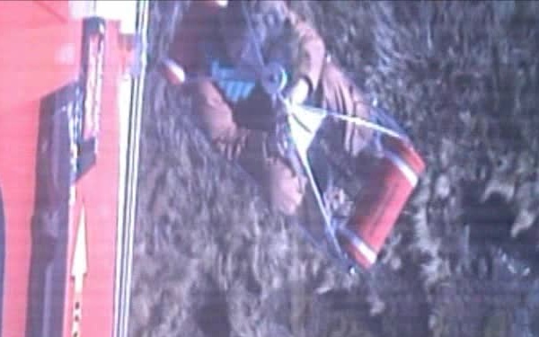 Coast Guard Rescues Two Men and Their Dog